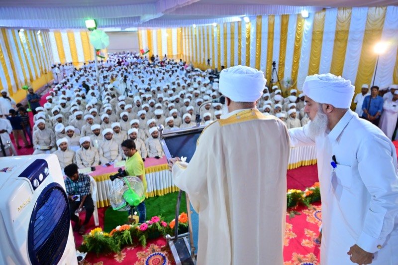Distinguished scholars seated on stage at the Hashimi Convocation
